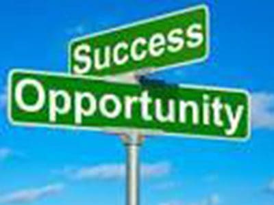 A street sign that says success and opportunity.